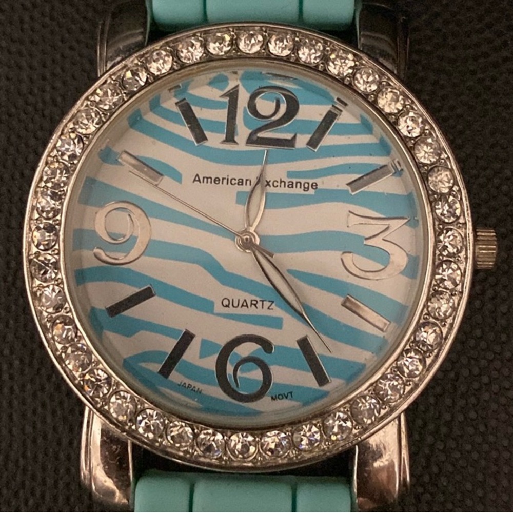 American Exchange Teal silicon band zebra pattern face pattern watch -used